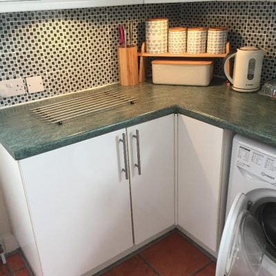 outdated jade kitchen worktop area
