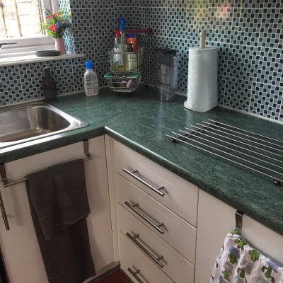outdated kitchen tiles and sink