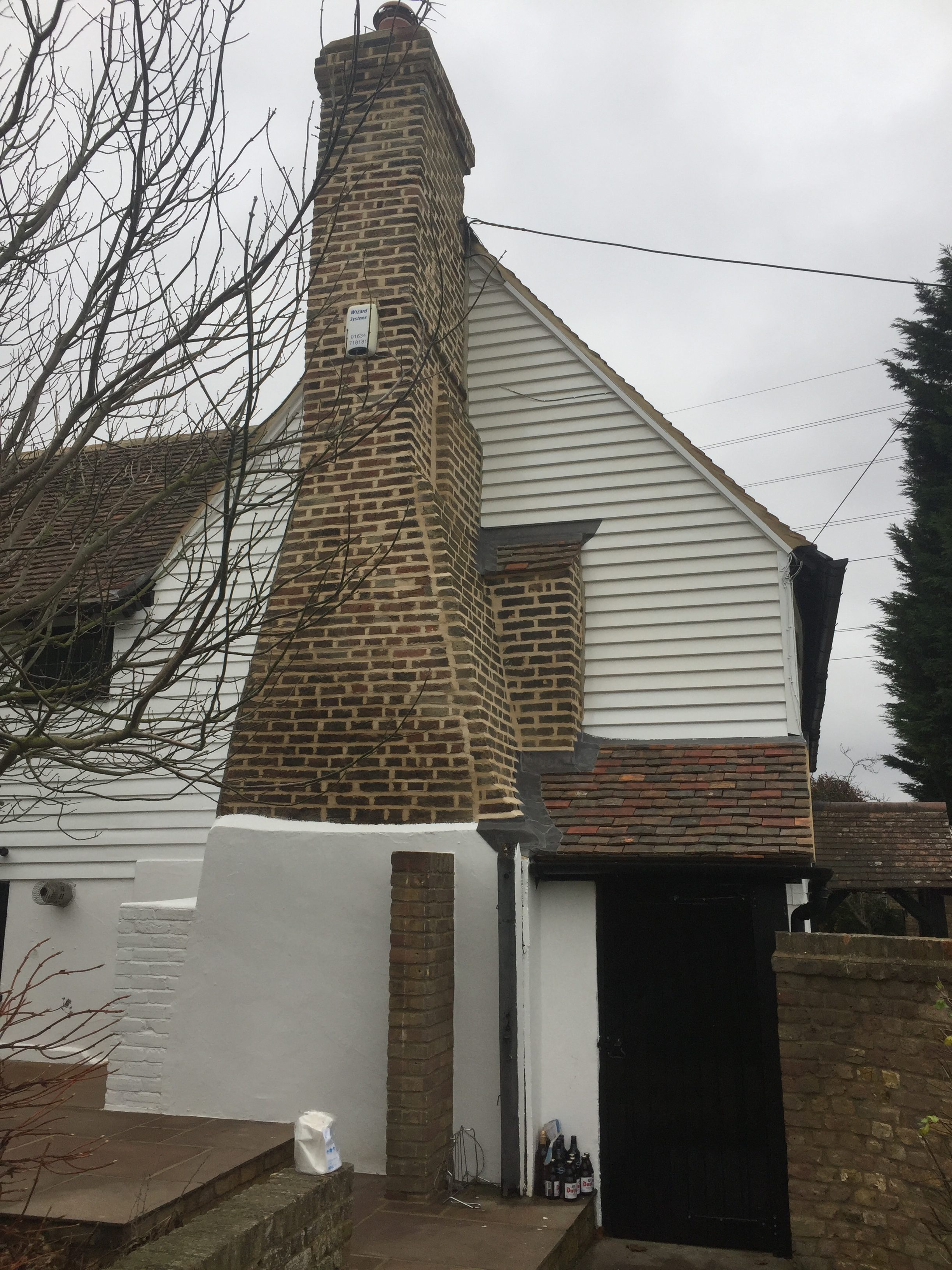 Repaired chimney stack & new roof / lead